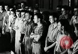 Standbild Goodyear Mitarbeiter Slogan Akron Ohio USA, 1941, aus Sekunde 9 historischem Filmmaterial Videoclip 65675030572