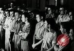 Standbild Goodyear Mitarbeiter Slogan Akron Ohio USA, 1941, aus Sekunde 12 historischem Filmmaterial Videoclip 65675030572