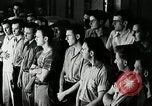 Standbild Goodyear Mitarbeiter Slogan Akron Ohio USA, 1941, aus Sekunde 13 historischem Filmmaterial Videoclip 65675030572