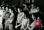 Standbild Goodyear Mitarbeiter Slogan Akron Ohio USA, 1941, aus Sekunde 14 historischem Filmmaterial Videoclip 65675030572