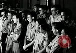 Standbild Goodyear Mitarbeiter Slogan Akron Ohio USA, 1941, aus Sekunde 15 historischem Filmmaterial Videoclip 65675030572