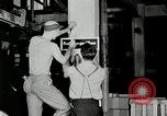 Standbild Goodyear Mitarbeiter Slogan Akron Ohio USA, 1941, aus Sekunde 24 historischem Filmmaterial Videoclip 65675030572