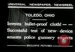 Image of bullet proof cloth test Toledo Ohio USA, 1932, second 3 stock footage video 65675030579