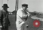 Image of bullet proof cloth test Toledo Ohio USA, 1932, second 14 stock footage video 65675030579