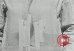 Image of bullet proof cloth test Toledo Ohio USA, 1932, second 25 stock footage video 65675030579