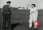 Image of bullet proof cloth test Toledo Ohio USA, 1932, second 47 stock footage video 65675030579