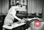 Image of farm family in evening Saint Clairsville Ohio USA, 1940, second 3 stock footage video 65675030605