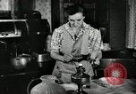 Image of farm family in evening Saint Clairsville Ohio USA, 1940, second 30 stock footage video 65675030605