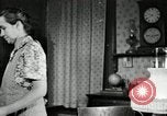 Image of farm family in evening Saint Clairsville Ohio USA, 1940, second 45 stock footage video 65675030605