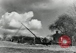 Image of rural family enjoying new benefits of electricity Saint Clairsville Ohio USA, 1940, second 56 stock footage video 65675030607