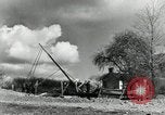Image of rural family enjoying new benefits of electricity Saint Clairsville Ohio USA, 1940, second 59 stock footage video 65675030607
