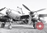 Image of Native tribesmen with P-38 planes New Guinea, 1944, second 1 stock footage video 65675030622