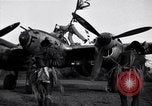 Image of Native tribesmen with P-38 planes New Guinea, 1944, second 3 stock footage video 65675030622