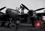 Image of Native tribesmen with P-38 planes New Guinea, 1944, second 5 stock footage video 65675030622