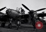 Image of Native tribesmen with P-38 planes New Guinea, 1944, second 6 stock footage video 65675030622