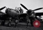 Image of Native tribesmen with P-38 planes New Guinea, 1944, second 7 stock footage video 65675030622