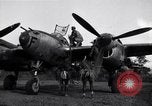 Image of Native tribesmen with P-38 planes New Guinea, 1944, second 8 stock footage video 65675030622