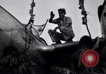Image of Native tribesmen with P-38 planes New Guinea, 1944, second 9 stock footage video 65675030622