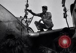 Image of Native tribesmen with P-38 planes New Guinea, 1944, second 10 stock footage video 65675030622