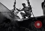 Image of Native tribesmen with P-38 planes New Guinea, 1944, second 14 stock footage video 65675030622