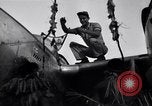 Image of Native tribesmen with P-38 planes New Guinea, 1944, second 15 stock footage video 65675030622