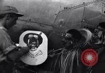 Image of Native tribesmen with P-38 planes New Guinea, 1944, second 25 stock footage video 65675030622