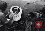 Image of Native tribesmen with P-38 planes New Guinea, 1944, second 27 stock footage video 65675030622