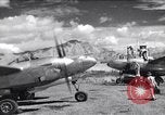Image of P-38 planes and ground crews of 80th Fighter Squadron Port Moresby New Guinea, 1944, second 1 stock footage video 65675030623