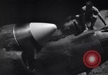 Image of P-38 planes and ground crews of 80th Fighter Squadron Port Moresby New Guinea, 1944, second 16 stock footage video 65675030623