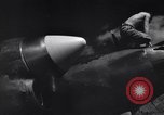 Image of P-38 planes and ground crews of 80th Fighter Squadron Port Moresby New Guinea, 1944, second 20 stock footage video 65675030623