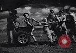 Image of P-38 planes and ground crews of 80th Fighter Squadron Port Moresby New Guinea, 1944, second 24 stock footage video 65675030623