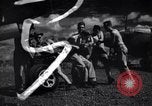 Image of P-38 planes and ground crews of 80th Fighter Squadron Port Moresby New Guinea, 1944, second 25 stock footage video 65675030623