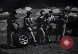 Image of P-38 planes and ground crews of 80th Fighter Squadron Port Moresby New Guinea, 1944, second 26 stock footage video 65675030623