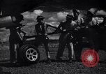 Image of P-38 planes and ground crews of 80th Fighter Squadron Port Moresby New Guinea, 1944, second 27 stock footage video 65675030623