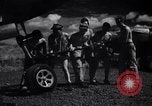 Image of P-38 planes and ground crews of 80th Fighter Squadron Port Moresby New Guinea, 1944, second 30 stock footage video 65675030623
