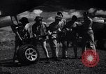 Image of P-38 planes and ground crews of 80th Fighter Squadron Port Moresby New Guinea, 1944, second 31 stock footage video 65675030623