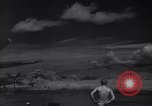 Image of P-38 planes and ground crews of 80th Fighter Squadron Port Moresby New Guinea, 1944, second 36 stock footage video 65675030623
