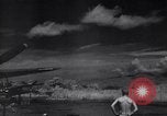 Image of P-38 planes and ground crews of 80th Fighter Squadron Port Moresby New Guinea, 1944, second 40 stock footage video 65675030623