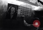 Image of P-38 planes and ground crews of 80th Fighter Squadron Port Moresby New Guinea, 1944, second 45 stock footage video 65675030623