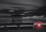 Image of P-38 planes and ground crews of 80th Fighter Squadron Port Moresby New Guinea, 1944, second 59 stock footage video 65675030623