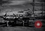 Immagine di Meccanica del 80th Fighter Squadron lavorare su un P-38 Nuova Guinea, 1944, secondo 5 filmato di repertorio 65675030624