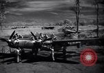 Immagine di Meccanica del 80th Fighter Squadron lavorare su un P-38 Nuova Guinea, 1944, secondo 7 filmato di repertorio 65675030624