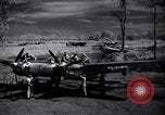 Immagine di Meccanica del 80th Fighter Squadron lavorare su un P-38 Nuova Guinea, 1944, secondo 8 filmato di repertorio 65675030624