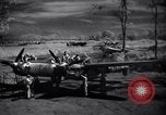 Immagine di Meccanica del 80th Fighter Squadron lavorare su un P-38 Nuova Guinea, 1944, secondo 9 filmato di repertorio 65675030624