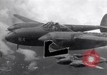 Image of P-38 Lightning airplanes of US Army 13th Air Force Pacific Theater, 1943, second 1 stock footage video 65675030626