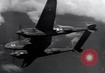 Image of P-38 Lightning airplanes of US Army 13th Air Force Pacific Theater, 1943, second 5 stock footage video 65675030626