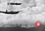 Image of P-38 Lightning airplanes of US Army 13th Air Force Pacific Theater, 1943, second 27 stock footage video 65675030626