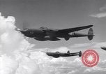Image of P-38 of 13th Army Air Force jettisons auxiliary fuel tanks Pacific Theater, 1943, second 12 stock footage video 65675030627