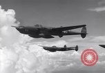 Image of P-38 of 13th Army Air Force jettisons auxiliary fuel tanks Pacific Theater, 1943, second 13 stock footage video 65675030627