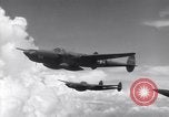 Image of P-38 of 13th Army Air Force jettisons auxiliary fuel tanks Pacific Theater, 1943, second 14 stock footage video 65675030627